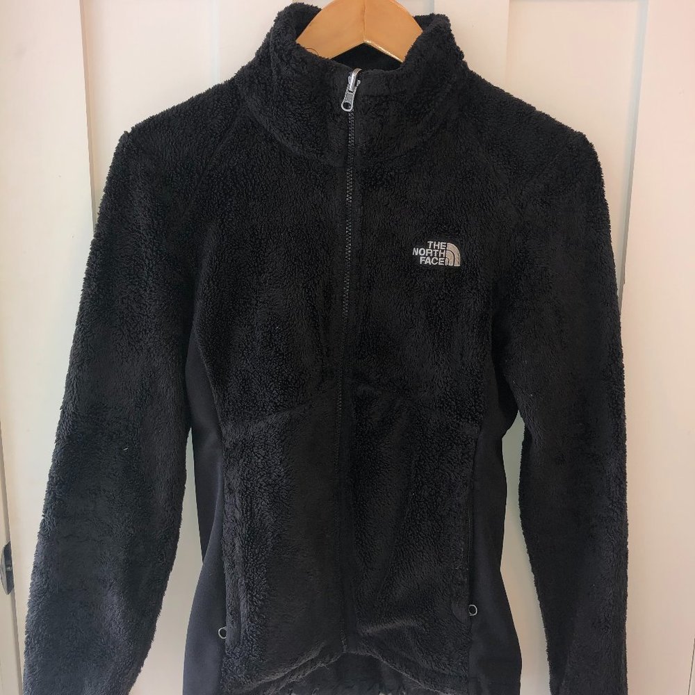 Womens black fuzzy North Face jacket.